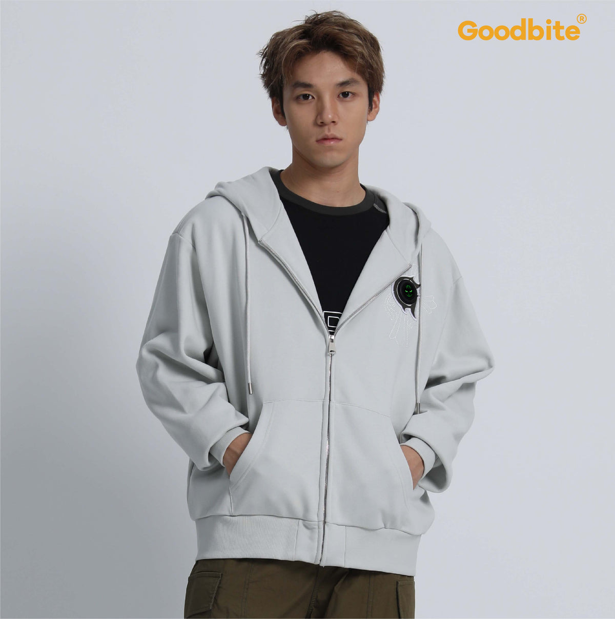 Goodbite A zip-up hoodie with animated emojis
